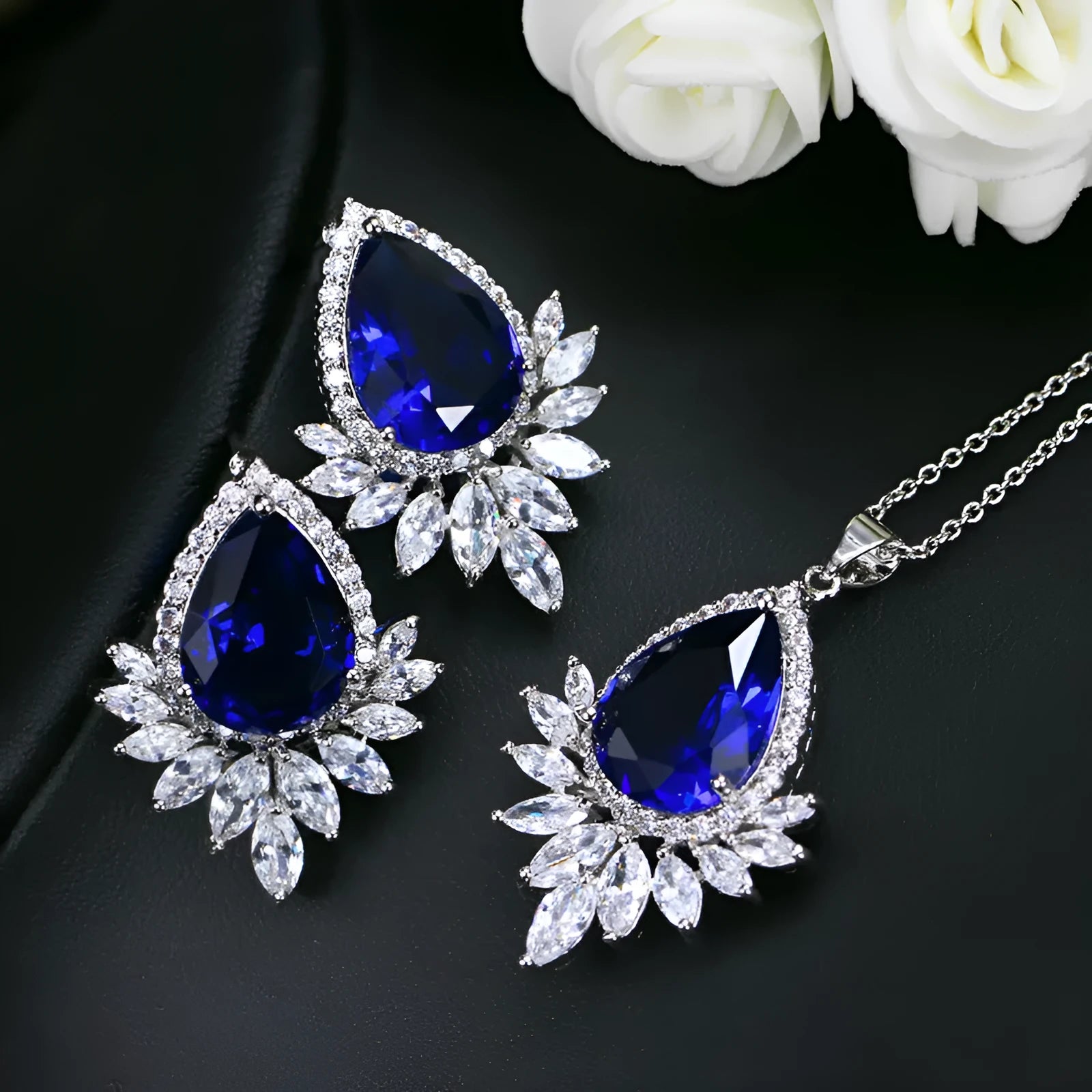 Blue, red, and white formal jewellery chain set with necklace and earrings for bridal banquets.
