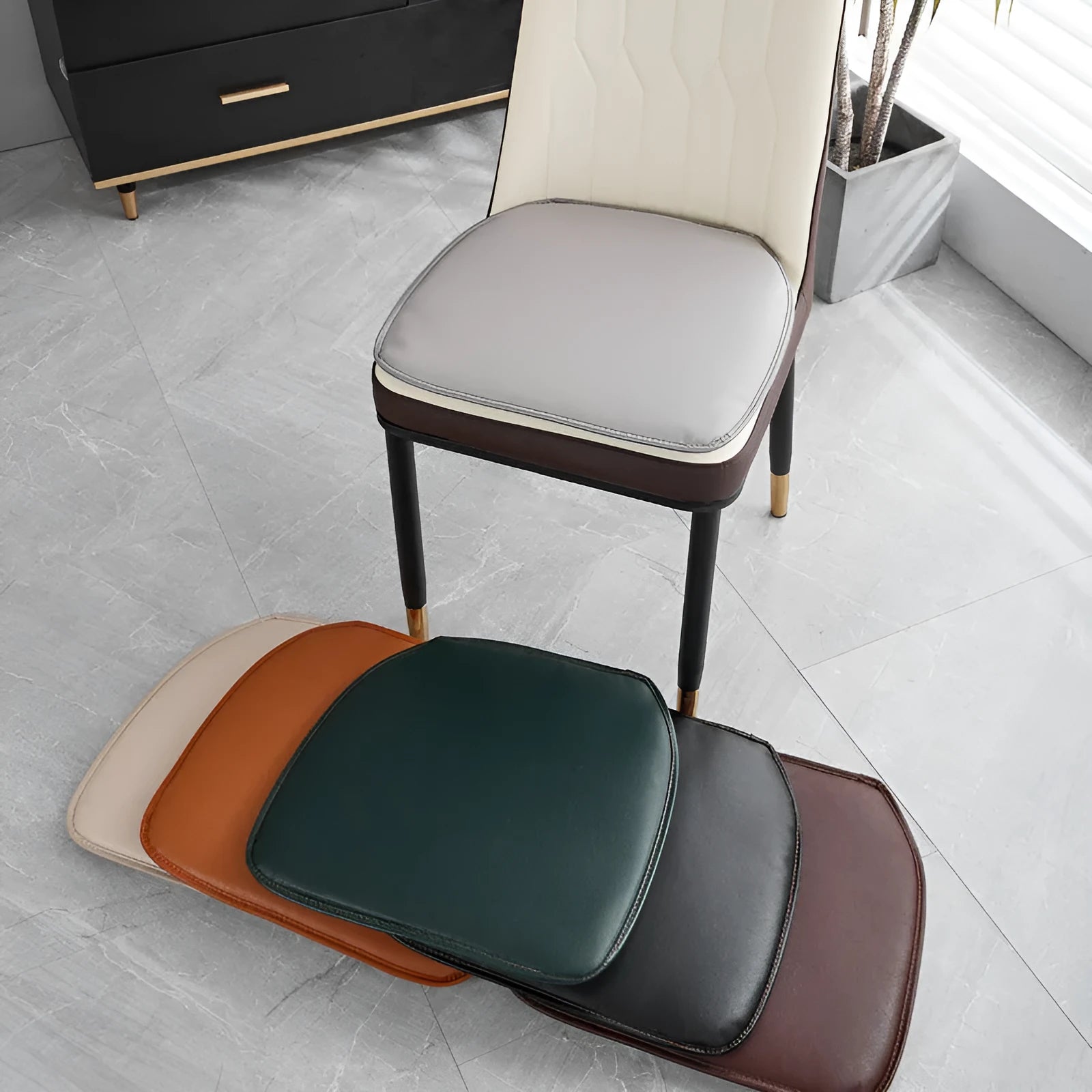 Beige leather horseshoe-shaped seat cushion with anti-slip base on a wooden chair