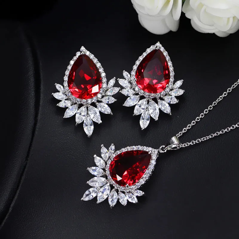 Blue, red, and white formal jewellery chain set with necklace and earrings for bridal banquets.