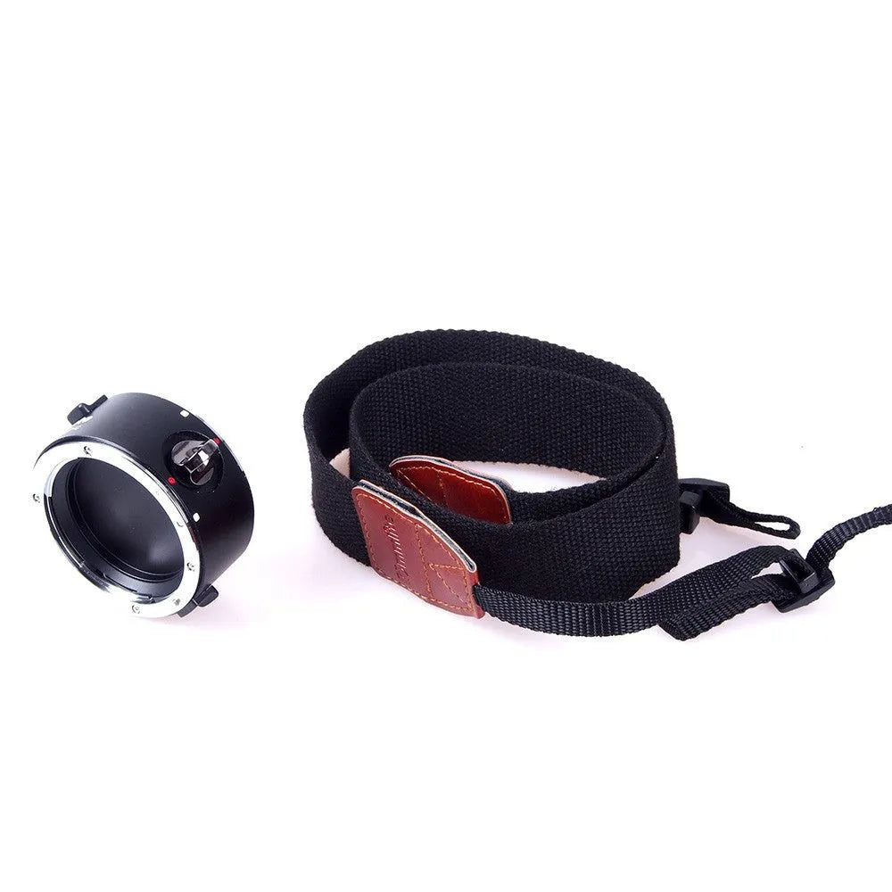 Nikon E-mount camera lens flipper with aluminium body and cotton shoulder strap