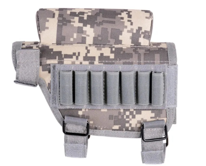Tactical buttstock cheek rest ammo carrier with non-slip pad holding 7 rounds on a black rifle stock