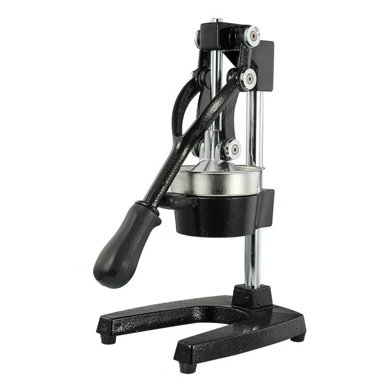 Tall black cast iron manual citrus juicer with stainless steel strainer on a kitchen counter.