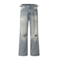 Blue men's straight-leg jeans with ripped distressing on the thigh, showing five-pocket design and zip fly.