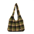 Women's soft plush plaid crossbody tote bag in army green, showing horizontal square shape and shoulder strap