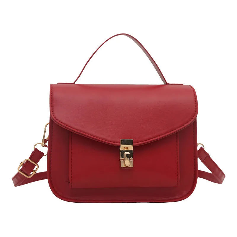 Retro style PU messenger bag in horizontal square format with sandwich pocket and crossbody strap