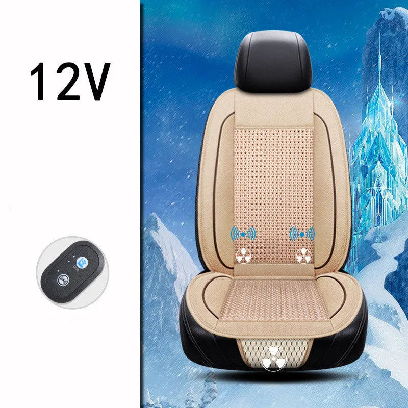 Square black car seat ventilation cushion with power cord, shown on a car seat.