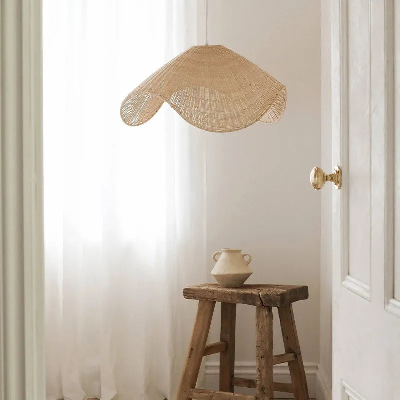 Handmade natural bamboo rattan chandelier with woven willow shade and warm LED light.