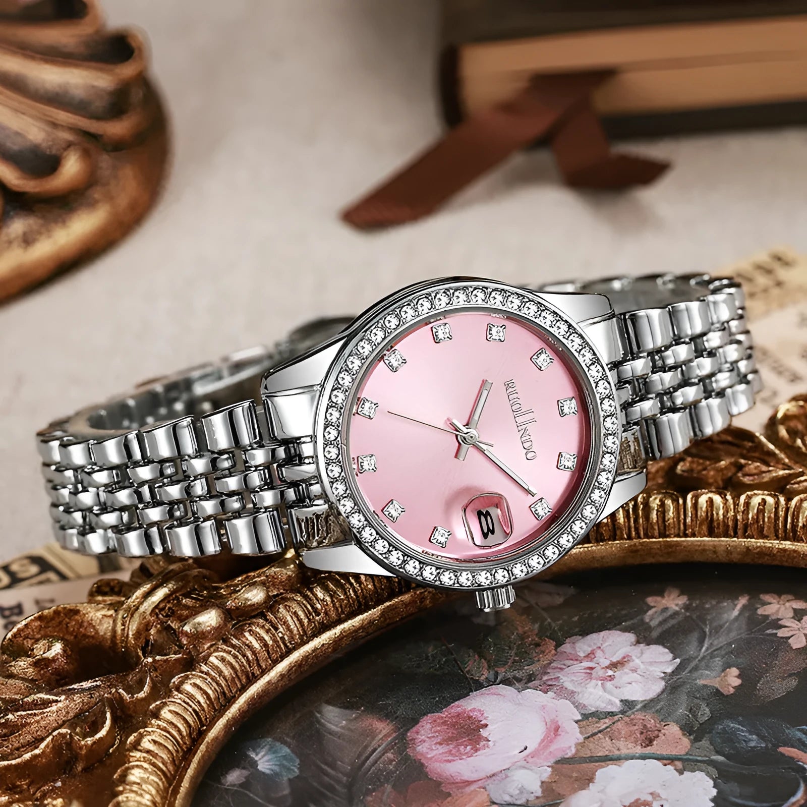 Women's silver calendar watch with circular 32mm dial and stainless steel folding buckle