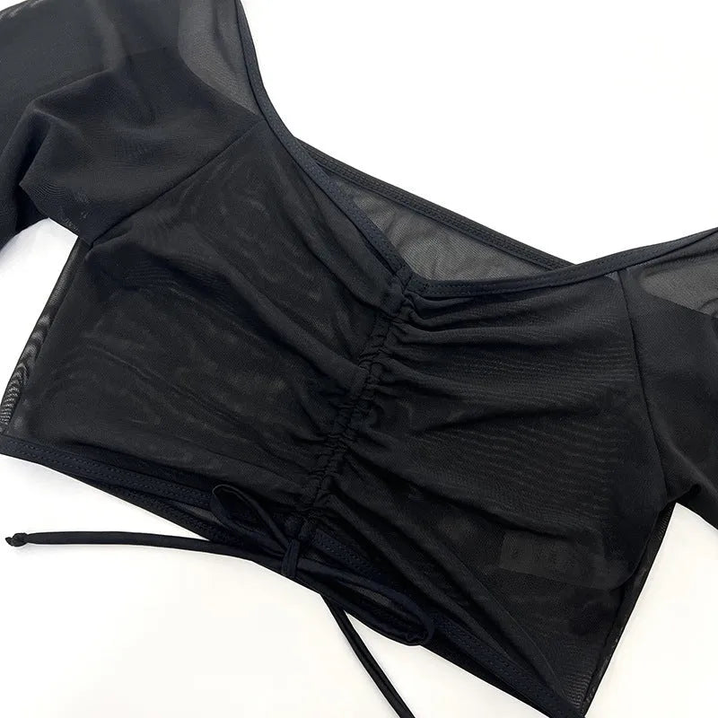 Black mesh women's four-piece bikini swimwear set with long sleeves