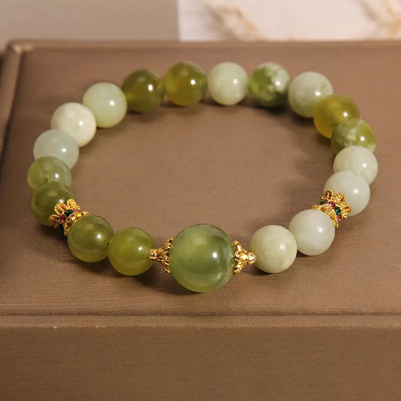 Women's bracelet made of green Xiuyan jade with an original design