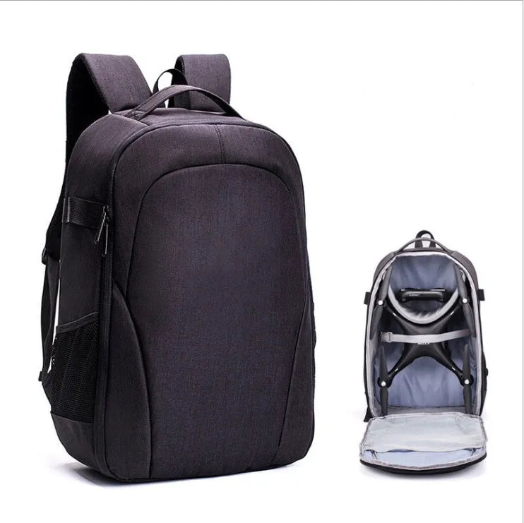 Black waterproof drone backpack with multiple compartments for camera and computer equipment