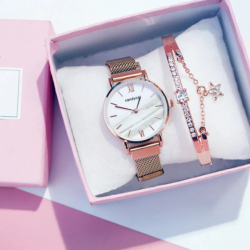 Women's retro marble watch with 32mm round dial, alloy strap, and titanium case back on white background