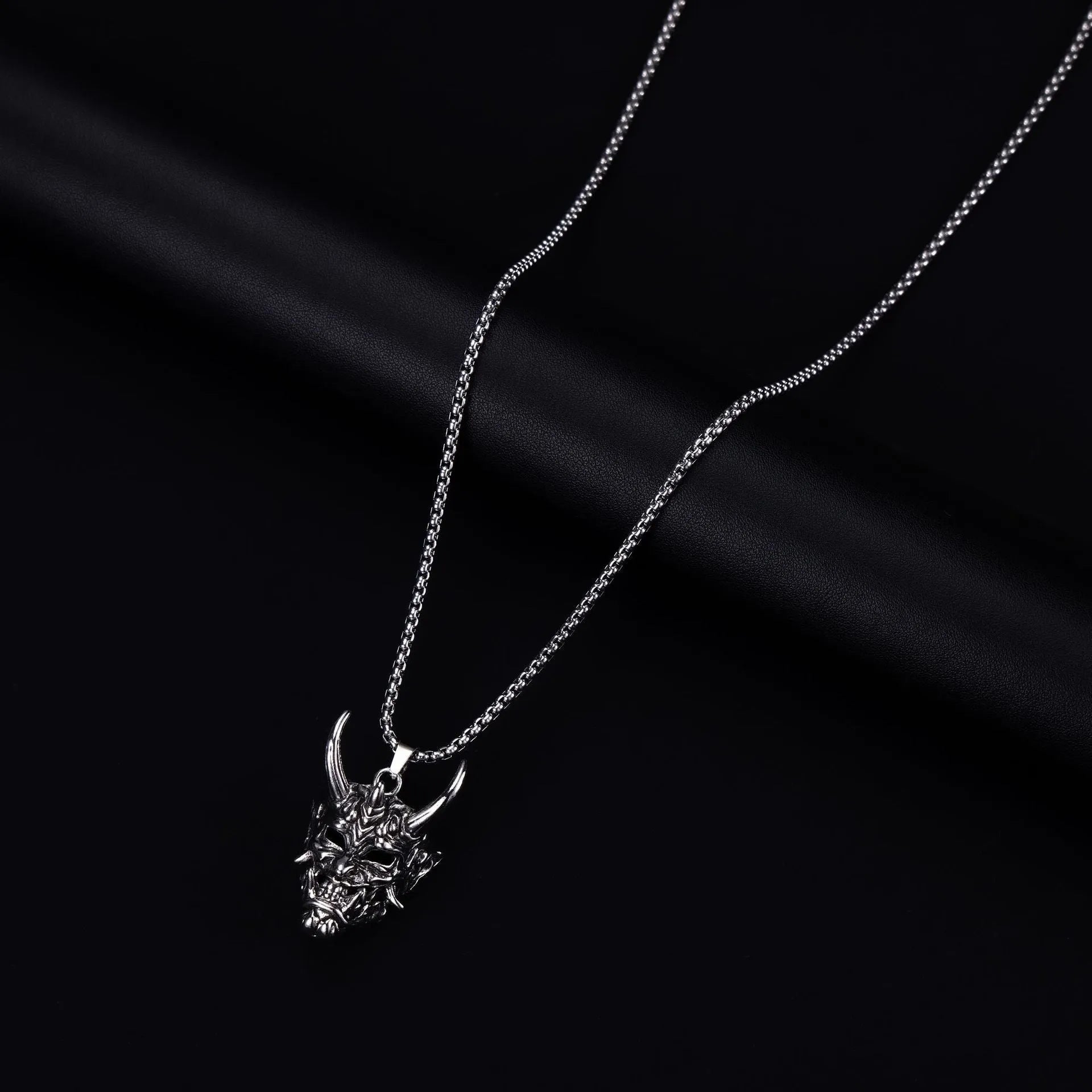 Men's silver electroplated zinc alloy pendant necklace measuring 40mm wide by 27mm high