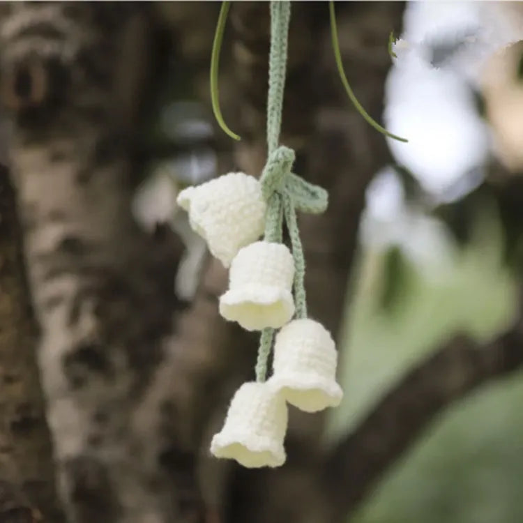 Green and white knitted rope car plant ornament with 8cm base and hanging rope.
