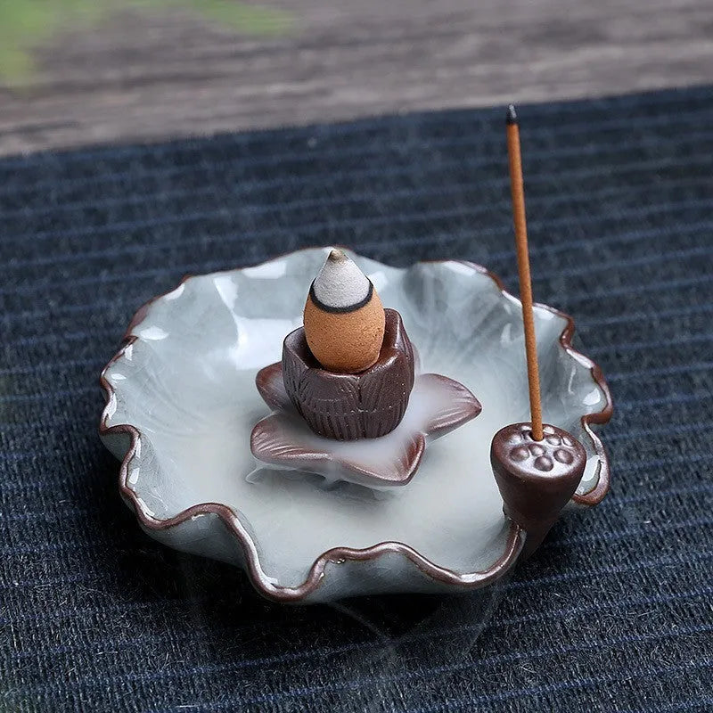 Square ceramic reverse flow incense burner with lotus and plum blossom decorative motifs