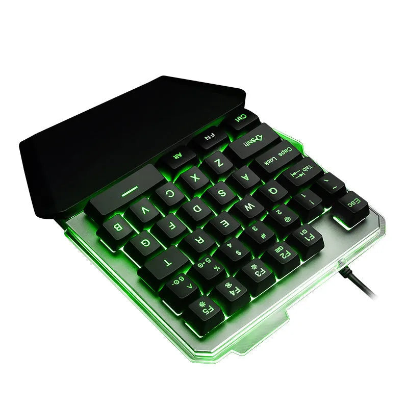 Black robotic one-handed G40 keyboard with RGB backlit keys on a desk.