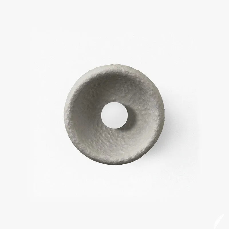 Japanese-style simple modern wall lamp with round resin shade in warm light