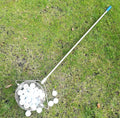 Metallic coloured 304 stainless steel golf ball picker retriever on a green.