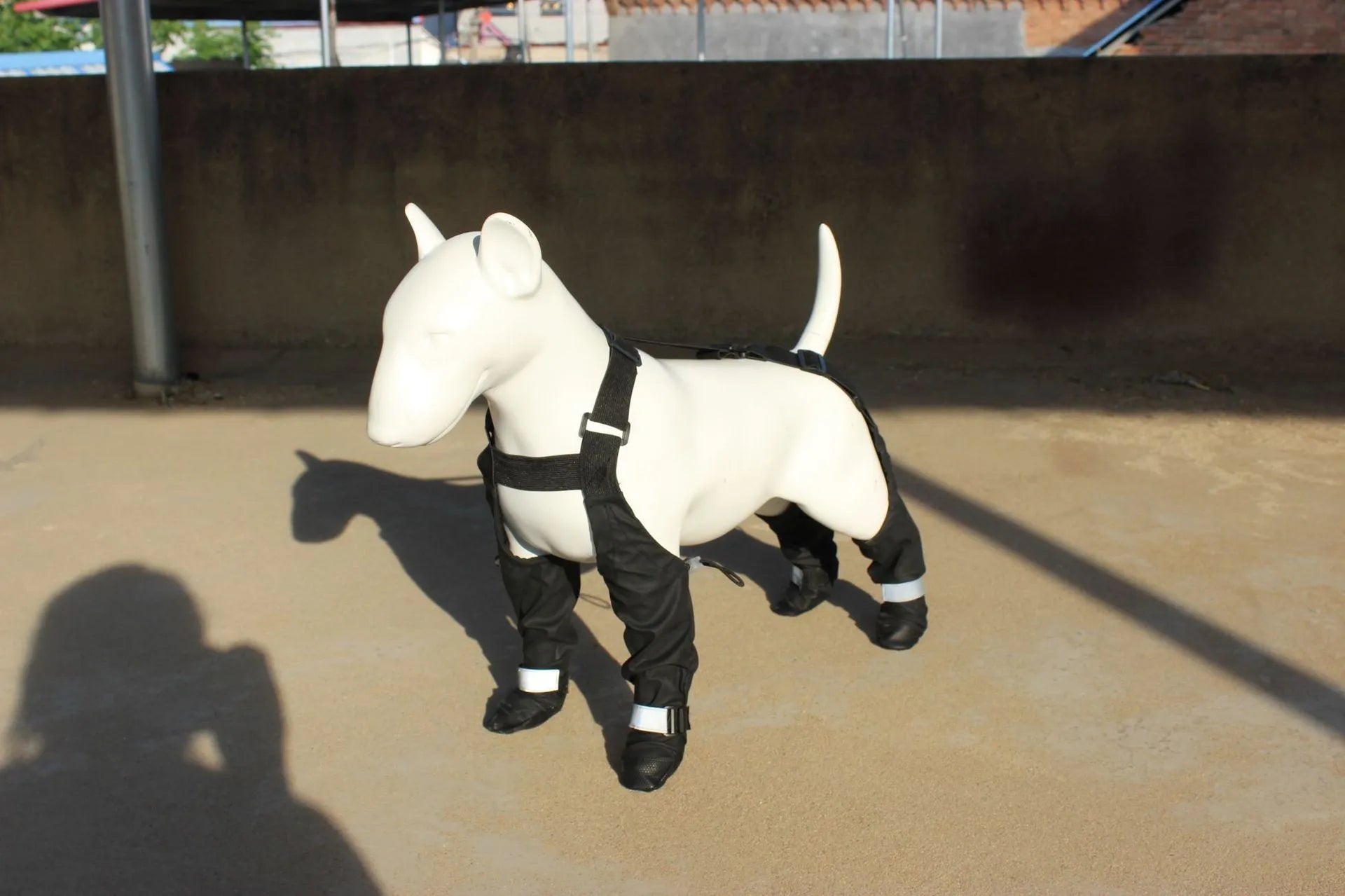 Black waterproof non-slip dog shoes in six sizes with adjustable straps for paw protection