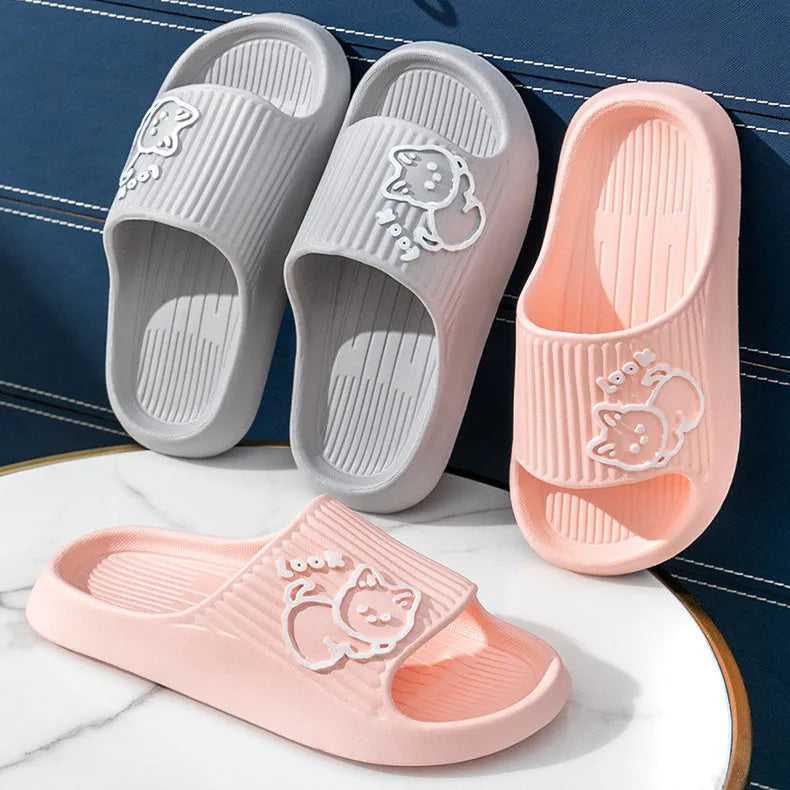 Women's green cat slippers with thick EVA platform sole, shown from above.