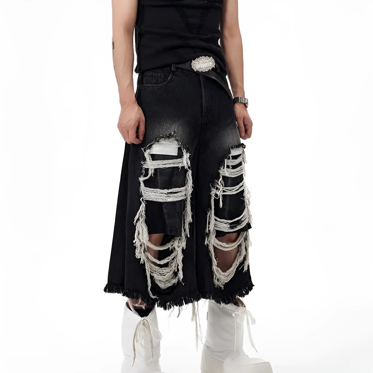 Black women's wide-leg cropped jeans with ripped patch details on the legs.