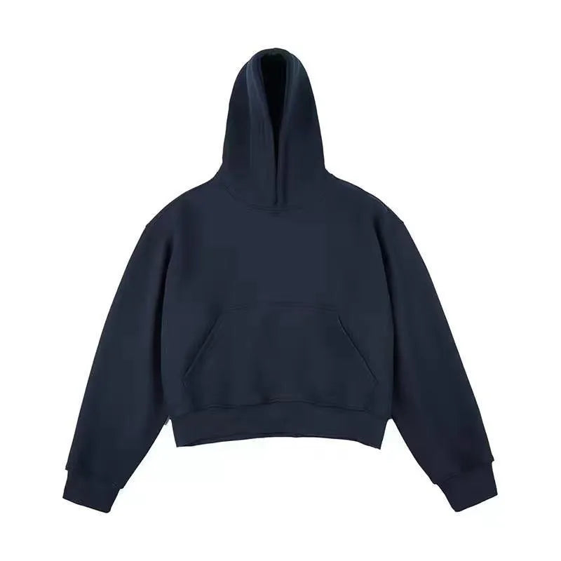 Men's short black Chinese cotton velvet hooded sweater with the hood down on a hanger.