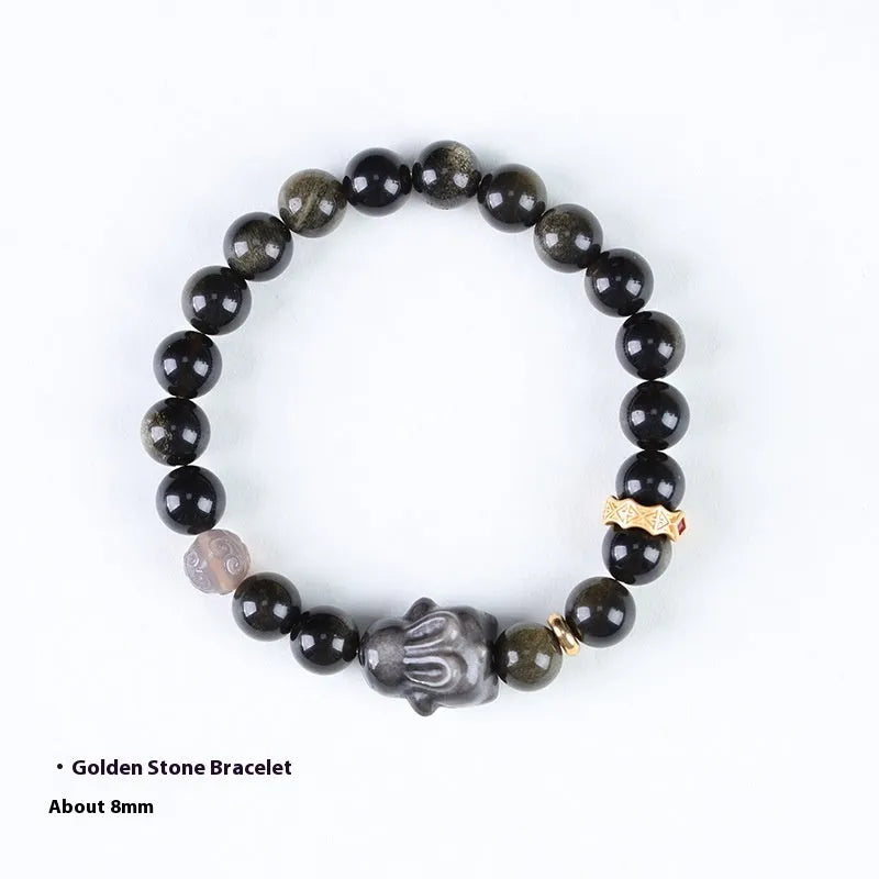Handmade national style obsidian bracelet with a detailed lying rabbit centrepiece in jin yaoshi and grey agate.