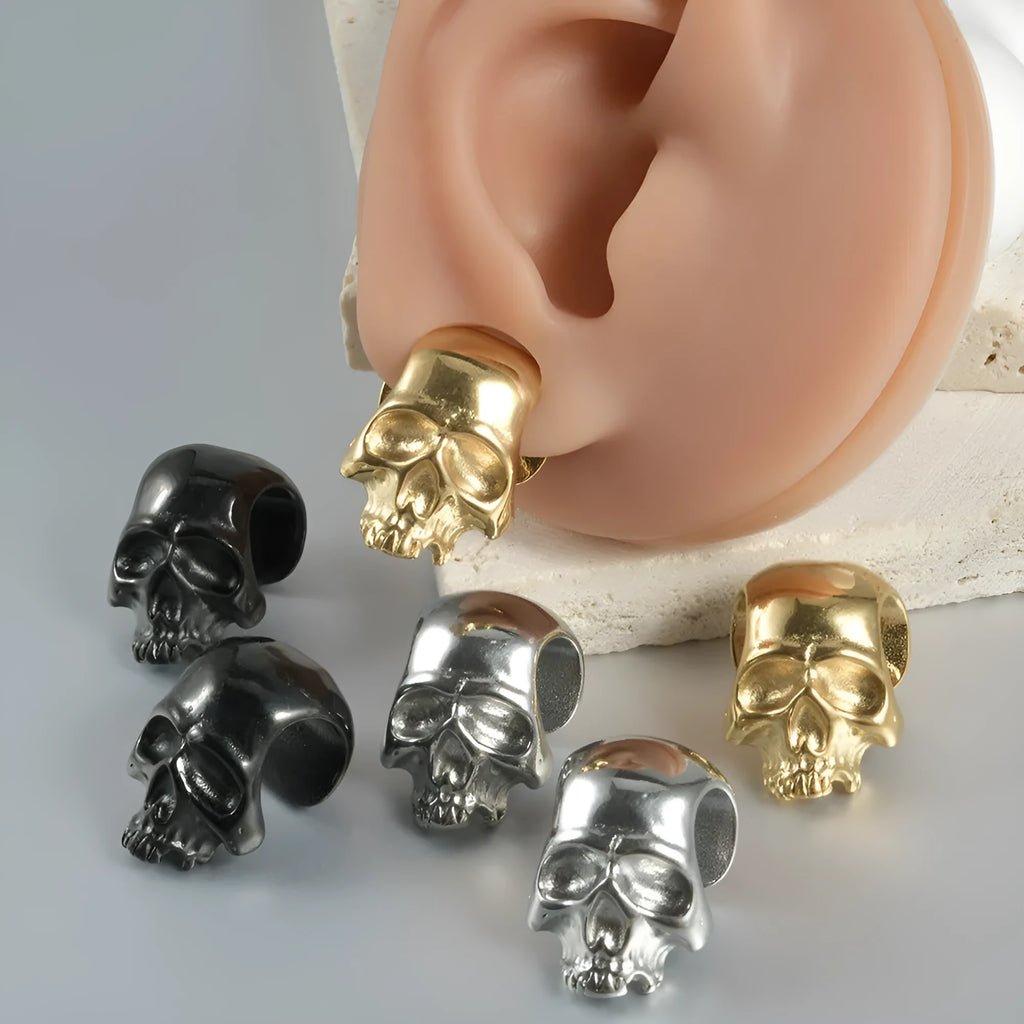 Stainless steel hollow skull Buddha earrings showing geometry shape and electroplated colour options