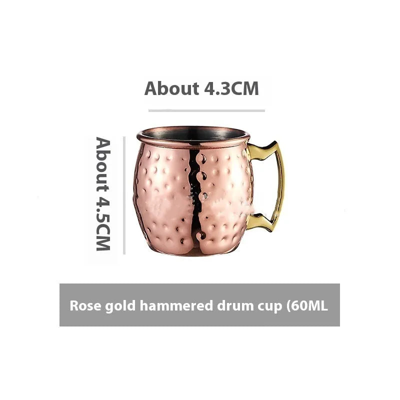 Stainless steel Moscow Mule cup with copper-plated finish in hammered and plain styles.