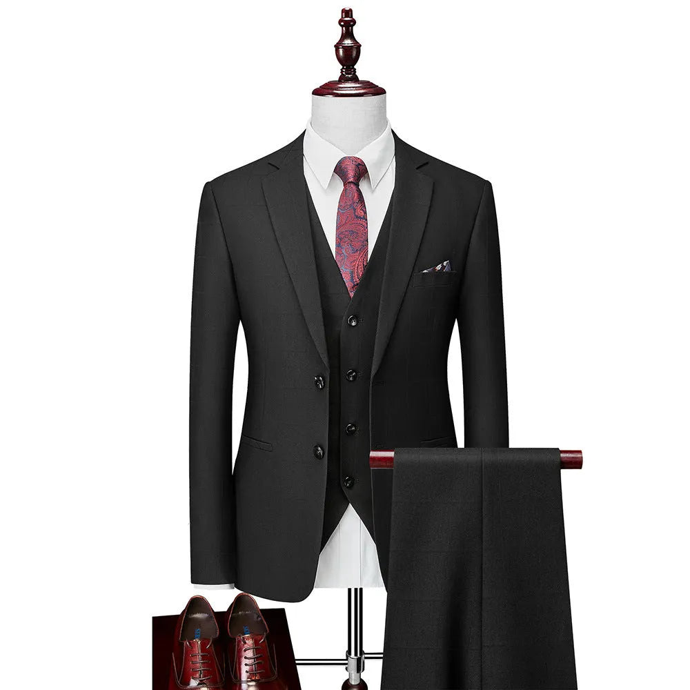 Men's navy blue slim fit three-piece suit with vest, jacket, and trousers for business casual occasions
