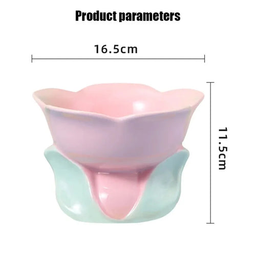 Blue ceramic elevated pet bowl with floral pattern and non-slip base for cats and small dogs.
