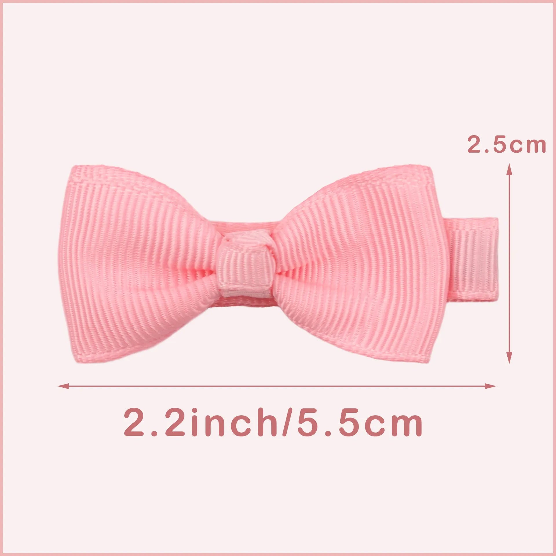 Assortment of pastel-coloured hair clips and bows for babies and toddlers on a white background.