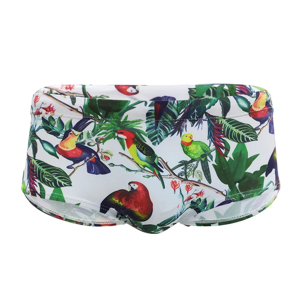 Men's navy swim trunks with white and red flower-bird print pattern, boxer briefs style