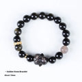 Handmade national style obsidian bracelet with a detailed lying rabbit centrepiece in jin yaoshi and grey agate.