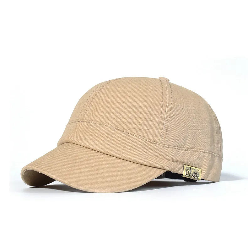 Unstructured cotton dad hat in khaki with short 5.5 cm brim and adjustable strap, front view