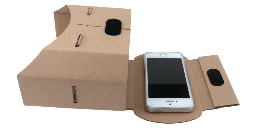 Corrugated paper virtual reality glasses for smartphones between 3.5 and 6 inches wide.