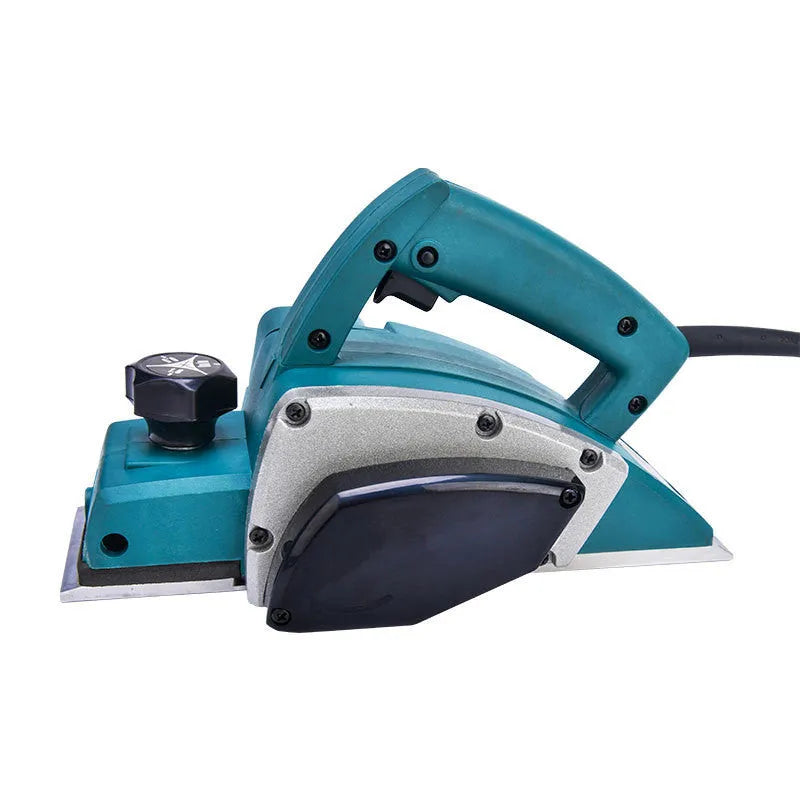 Red desktop electric wood planer with aluminium body showing 82mm cutting width
