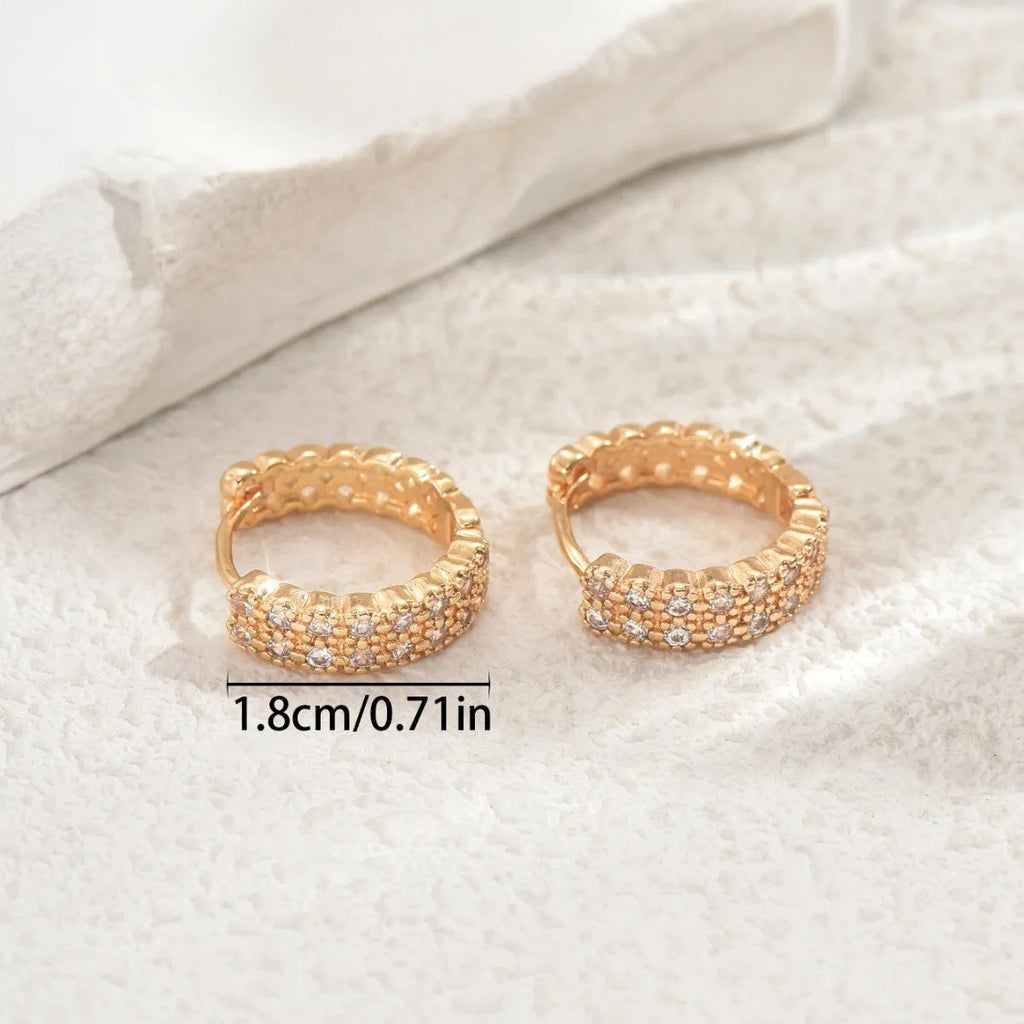 Geometric copper ear studs with round, dot, and ring elements in DE20288 colour