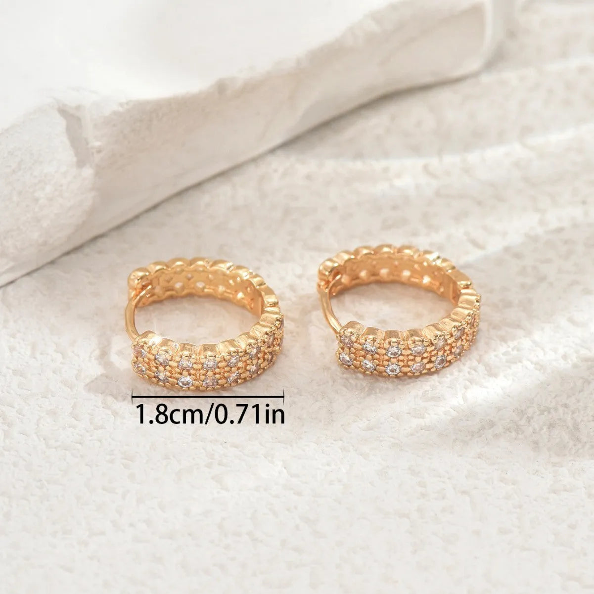Geometric copper ear studs with round, dot, and ring elements in DE20288 colour