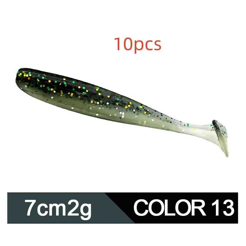 Soft plastic T-tail fishing lure in two-tone mandarin fish pattern, 7cm long.