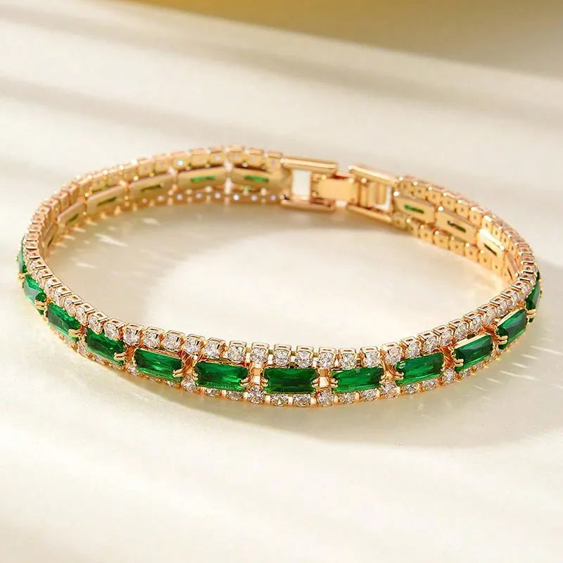 Unisex gold electroplated double-row diamond zirconia tennis chain bracelet on white background