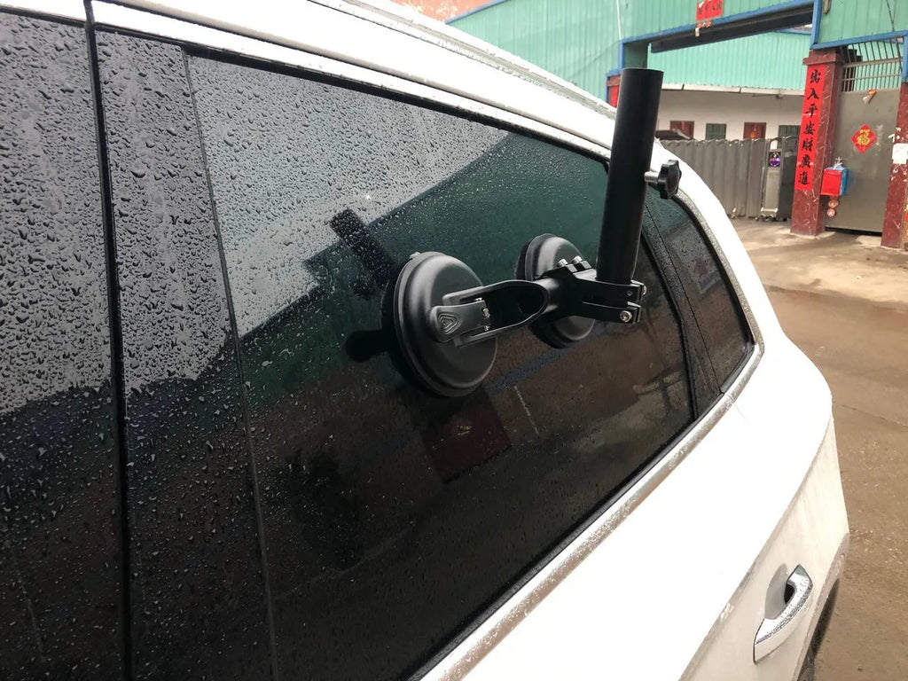 Black off-road car flagpole sucker base with round glass suction cup and rubber disc.