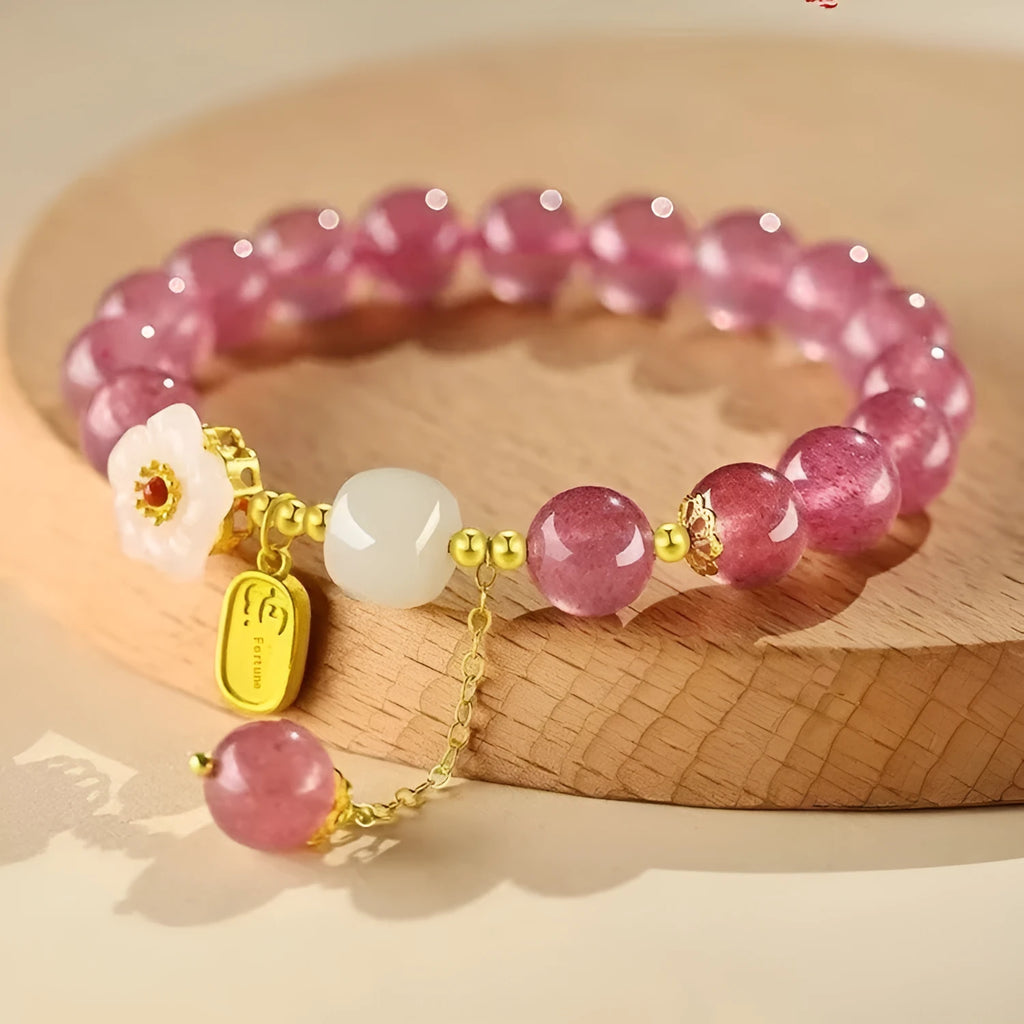 Handmade strawberry quartz crystal bracelet for women showing five natural stone design variations