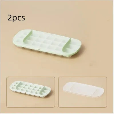 High-capacity plastic ice cube tray with grid pattern and ice shovel, shown in blue colour.