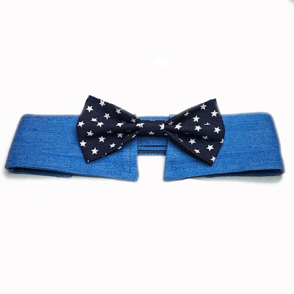 Blue denim dog collar styled as a necktie with white star pattern, showing fastener tape adjustment.