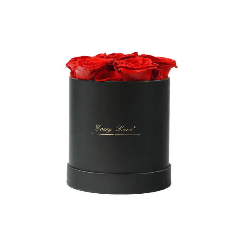 Handmade everlasting rose in hug bucket with preserved flower material, available in white red pink black blue colours