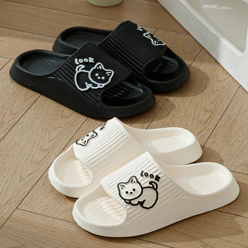 Women's green cat slippers with thick EVA platform sole, shown from above.