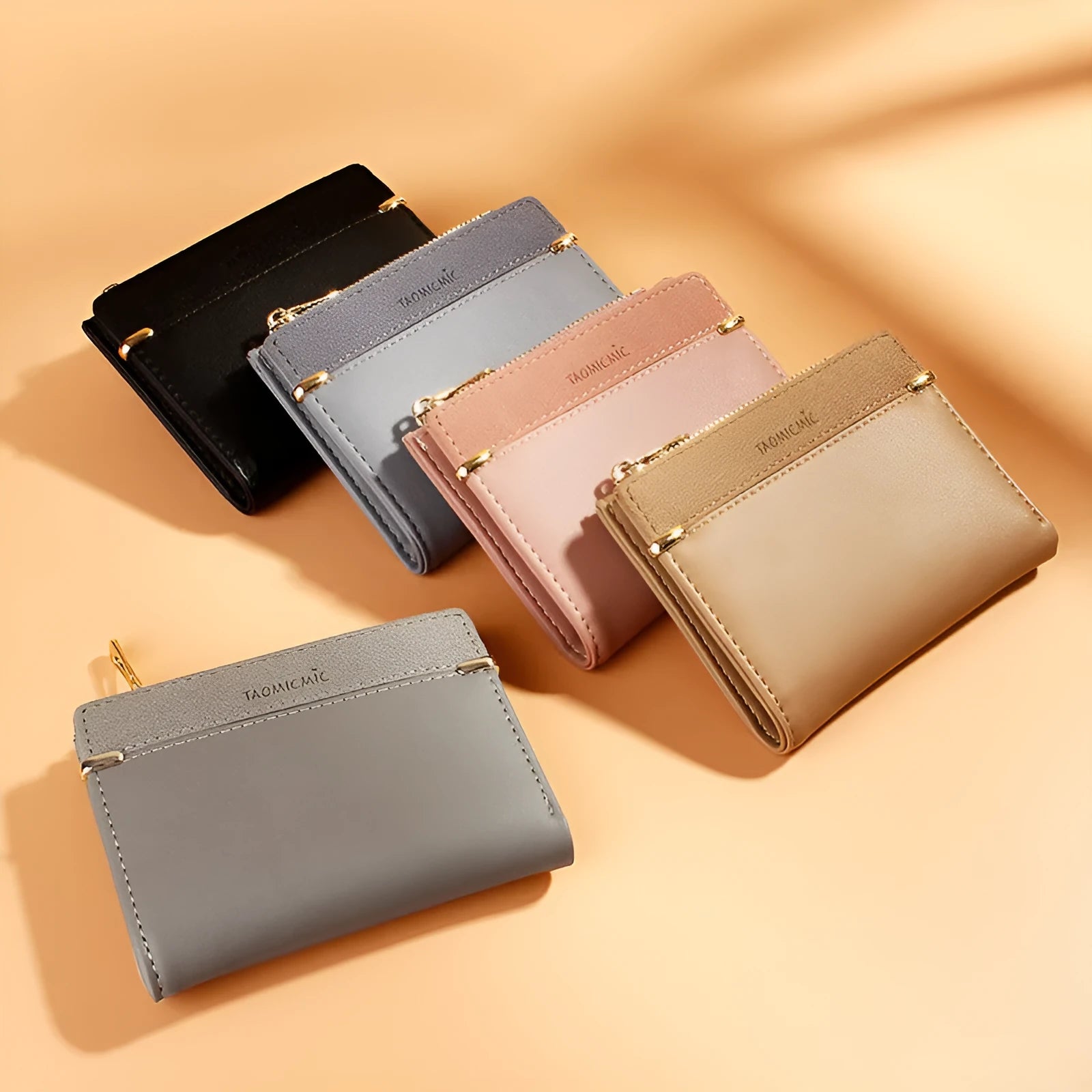 A closed ladies short zipper wallet in PU leather, showing its compact 2-fold design.