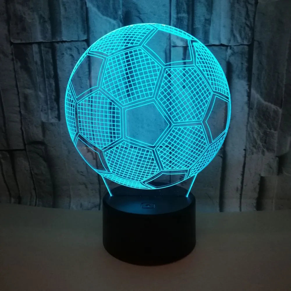 Football-shaped 3D night light with colour-changing acrylic panel on ABS base