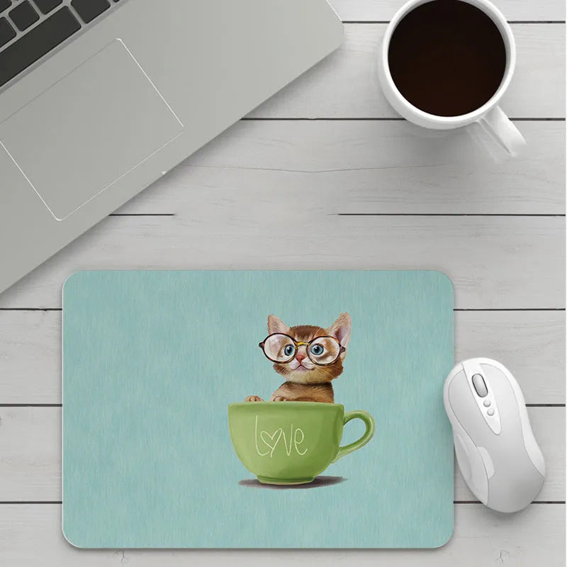 Custom cartoon mouse pad with thickening, showing example artwork on non-slip rubber and cloth base.